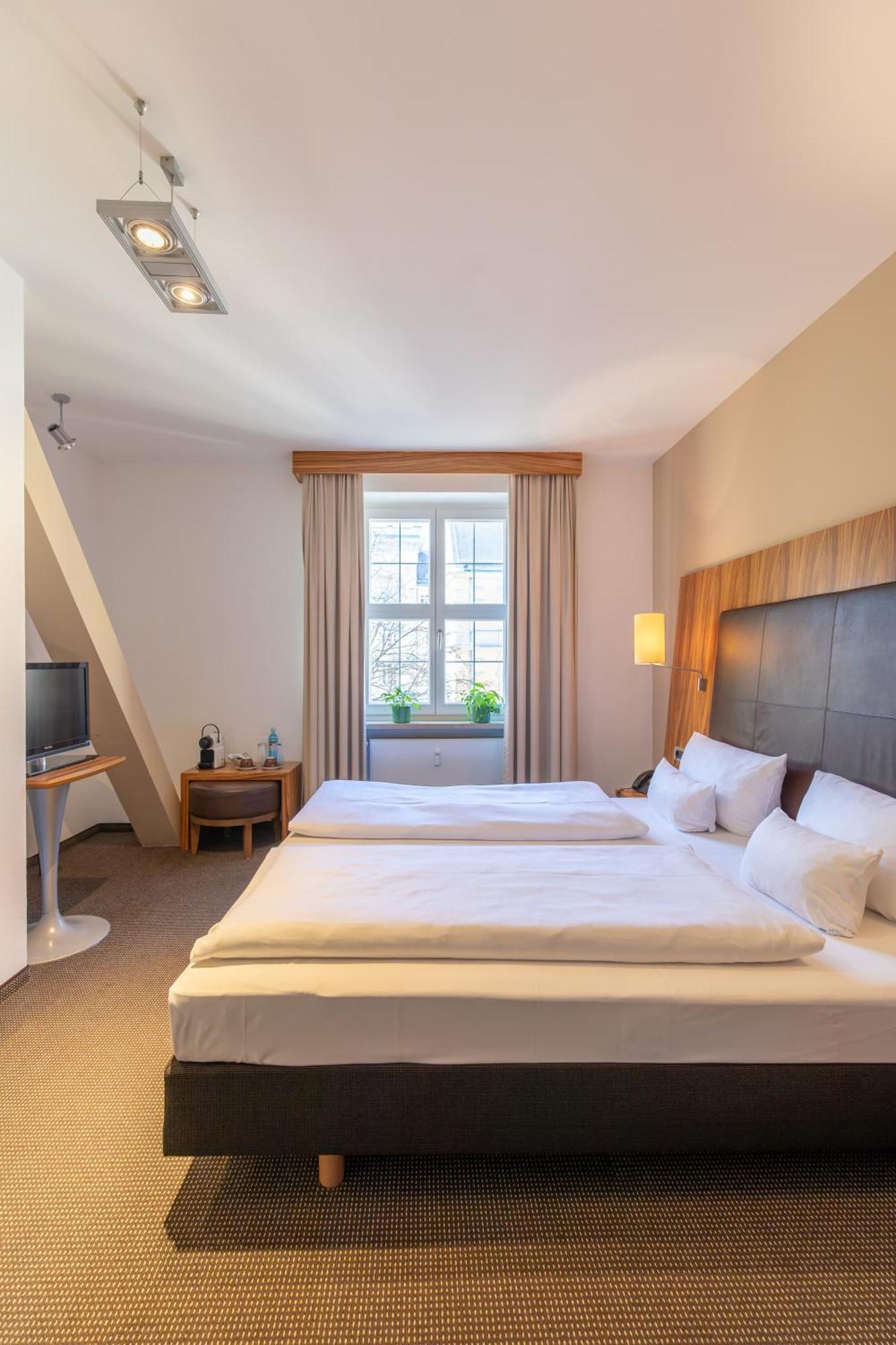 Herzogshof - Boutique-Hotel Am Dom Ratisbona Quarto foto